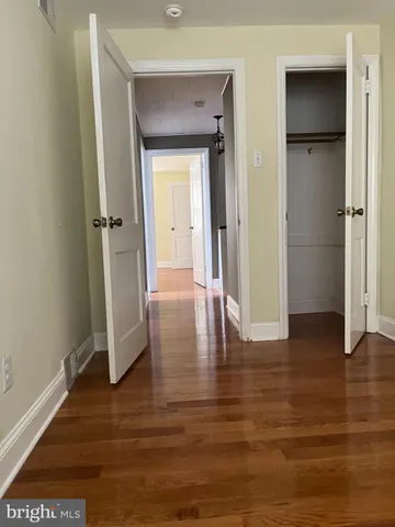 a view of entryway with wooden floor