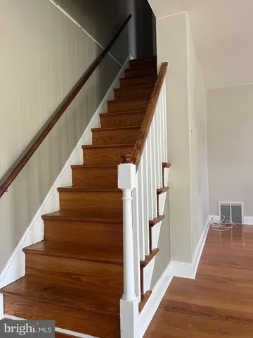 a bathroom with a toilet a sink and bathtub