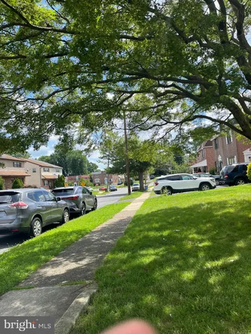 a childrens park with lots of swings and slides