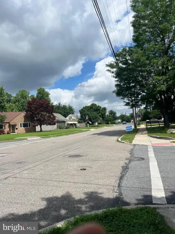 a view of street with houses