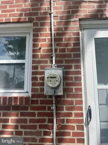 a front view of a house with window and door