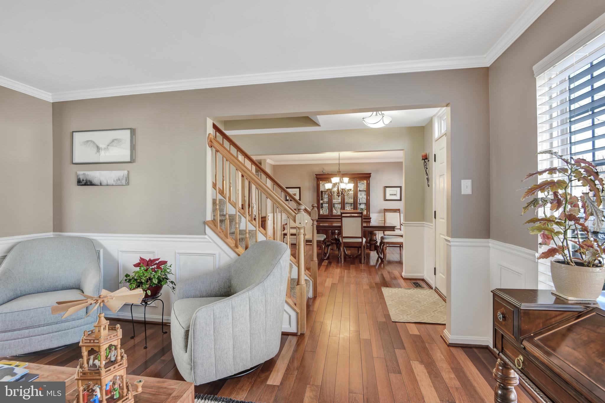 5944 Sandy Ridge Elkridge, MD 21075 - Photo 11 of 42 a living room with furniture and a table