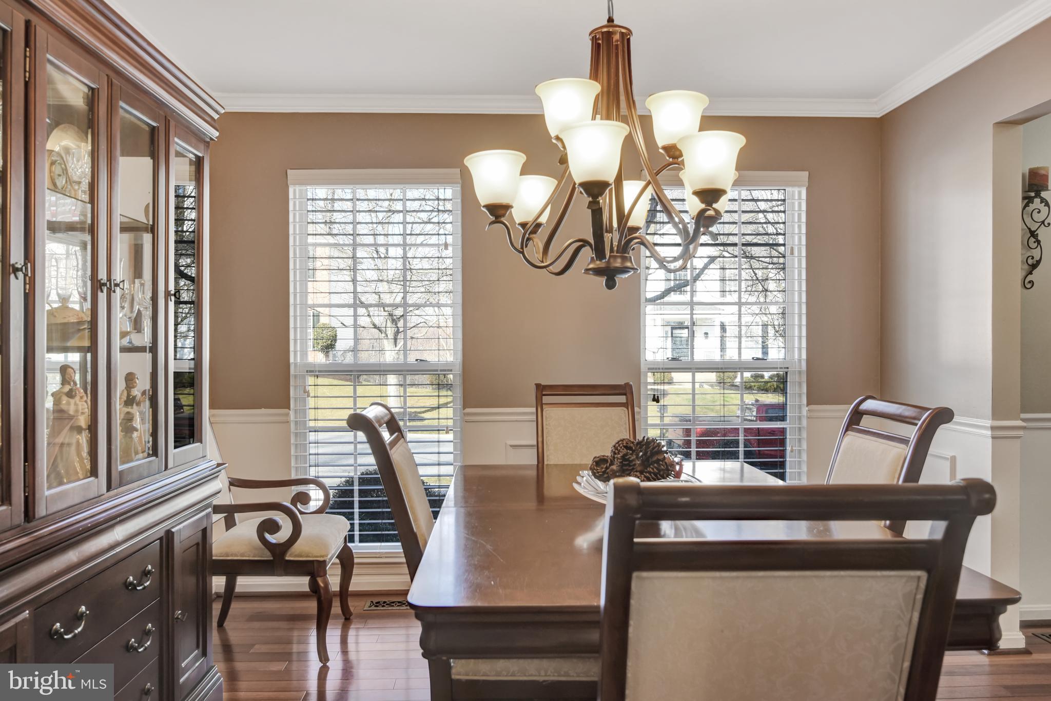 5944 Sandy Ridge Elkridge, MD 21075 - Photo 16 of 42 a view of a dining room with furniture window and outside view