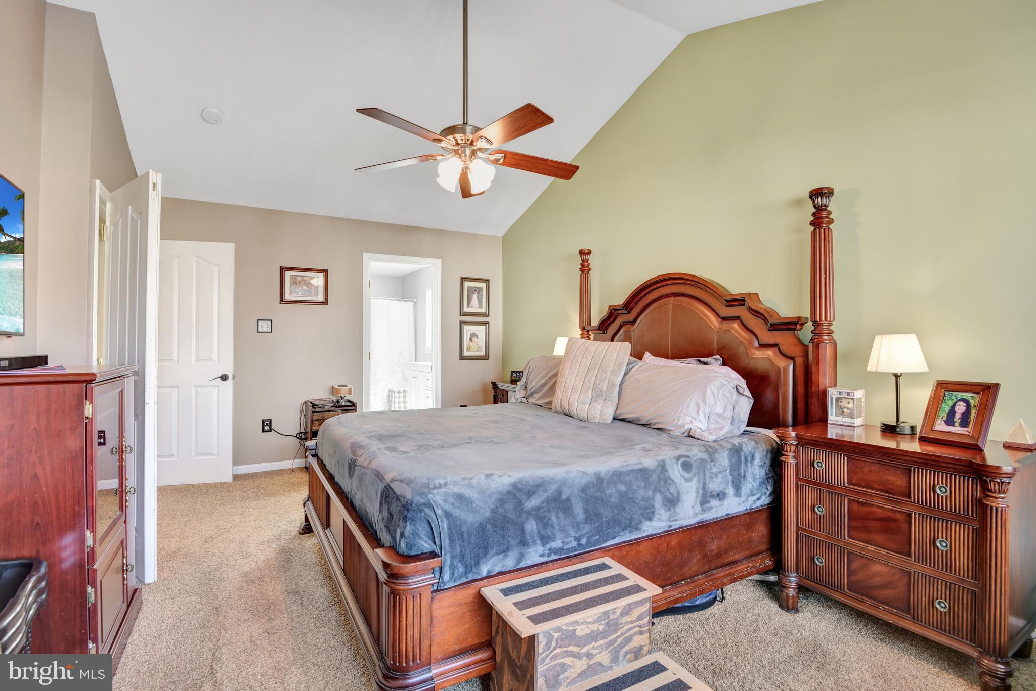 5944 Sandy Ridge Elkridge, MD 21075 - Photo 19 of 42 a bedroom with a bed and dresser