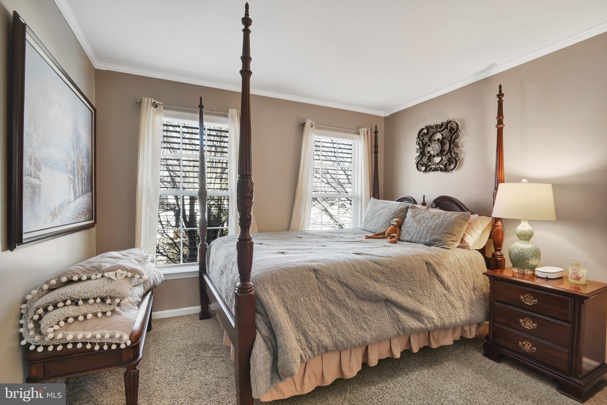 5944 Sandy Ridge Elkridge, MD 21075 - Photo 23 of 42 a bedroom with a bed and a window