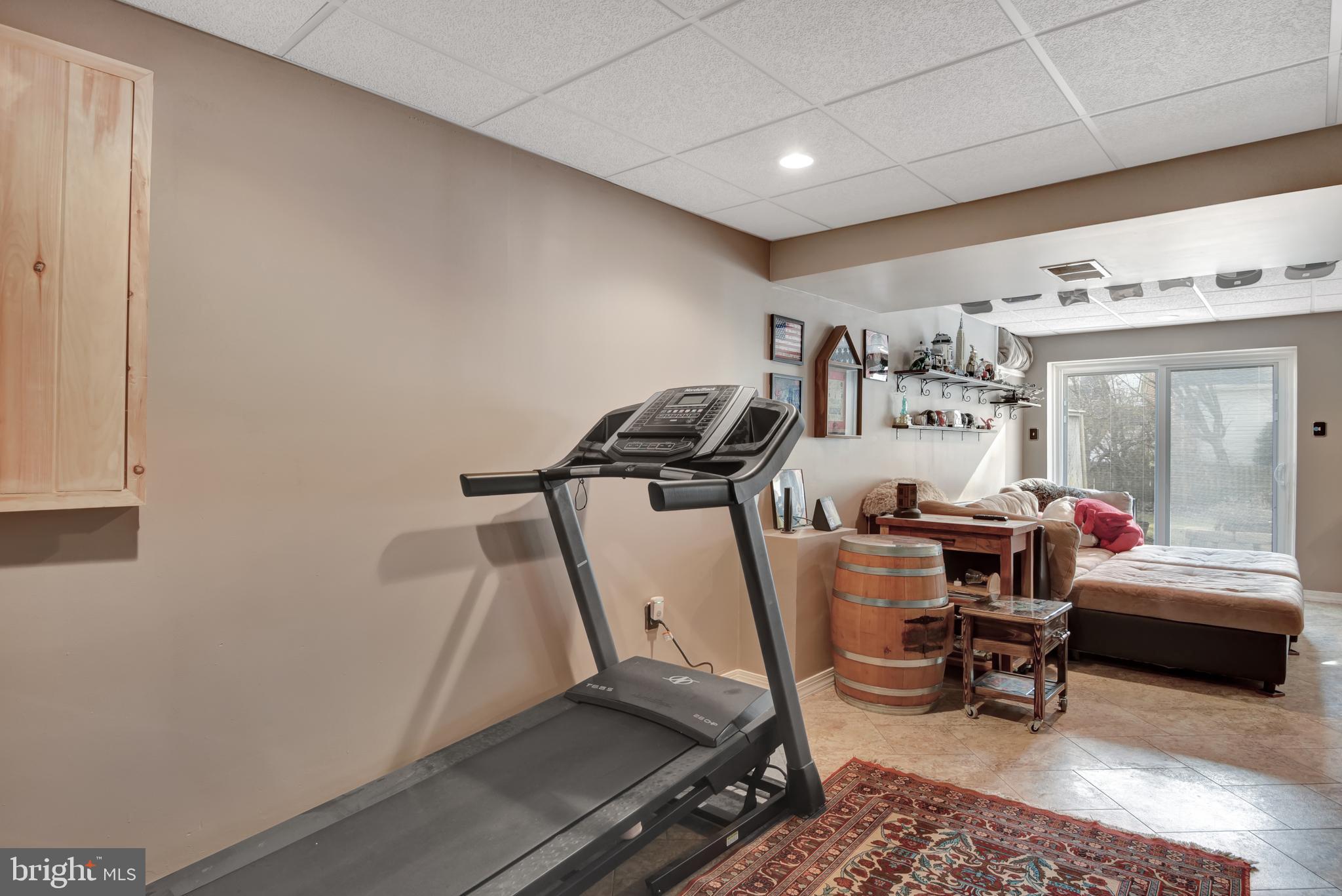 5944 Sandy Ridge Elkridge, MD 21075 - Photo 32 of 42 a view of a room with gym equipment