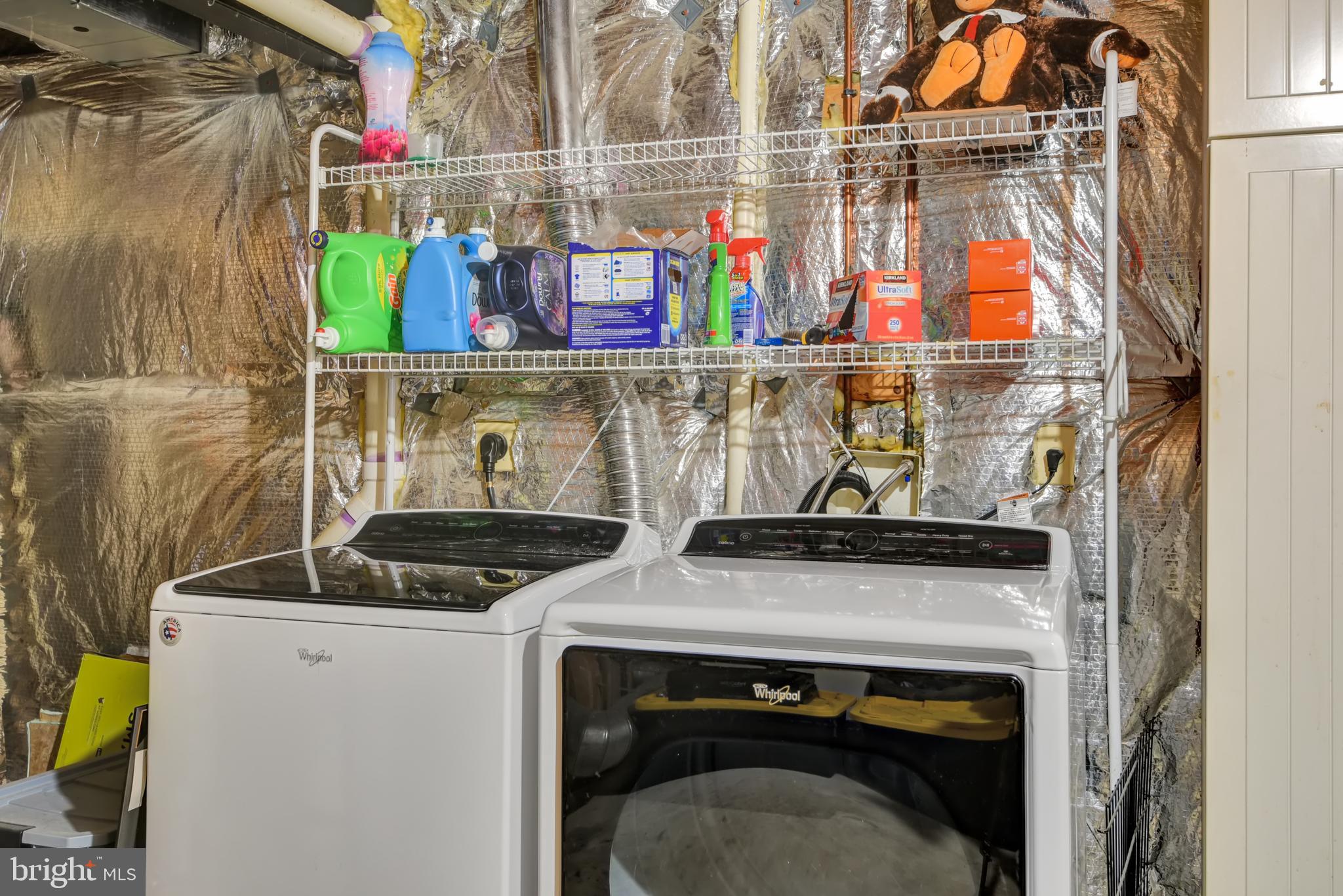 5944 Sandy Ridge Elkridge, MD 21075 - Photo 37 of 42 a utility room with stainless steel appliances a stove and a refrigerator