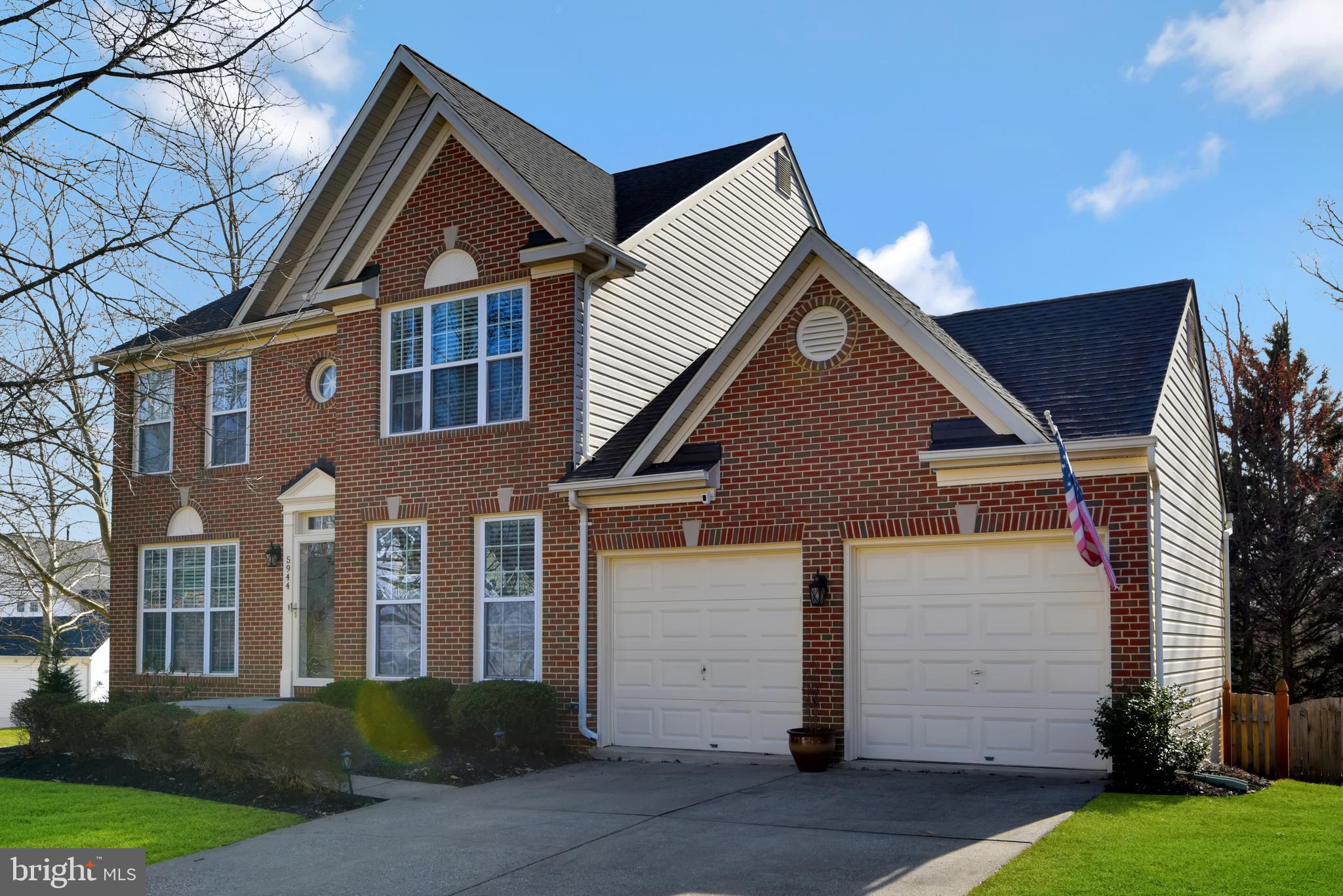 5944 Sandy Ridge Elkridge, MD 21075 - Photo 39 of 42 front view of a house with a yard
