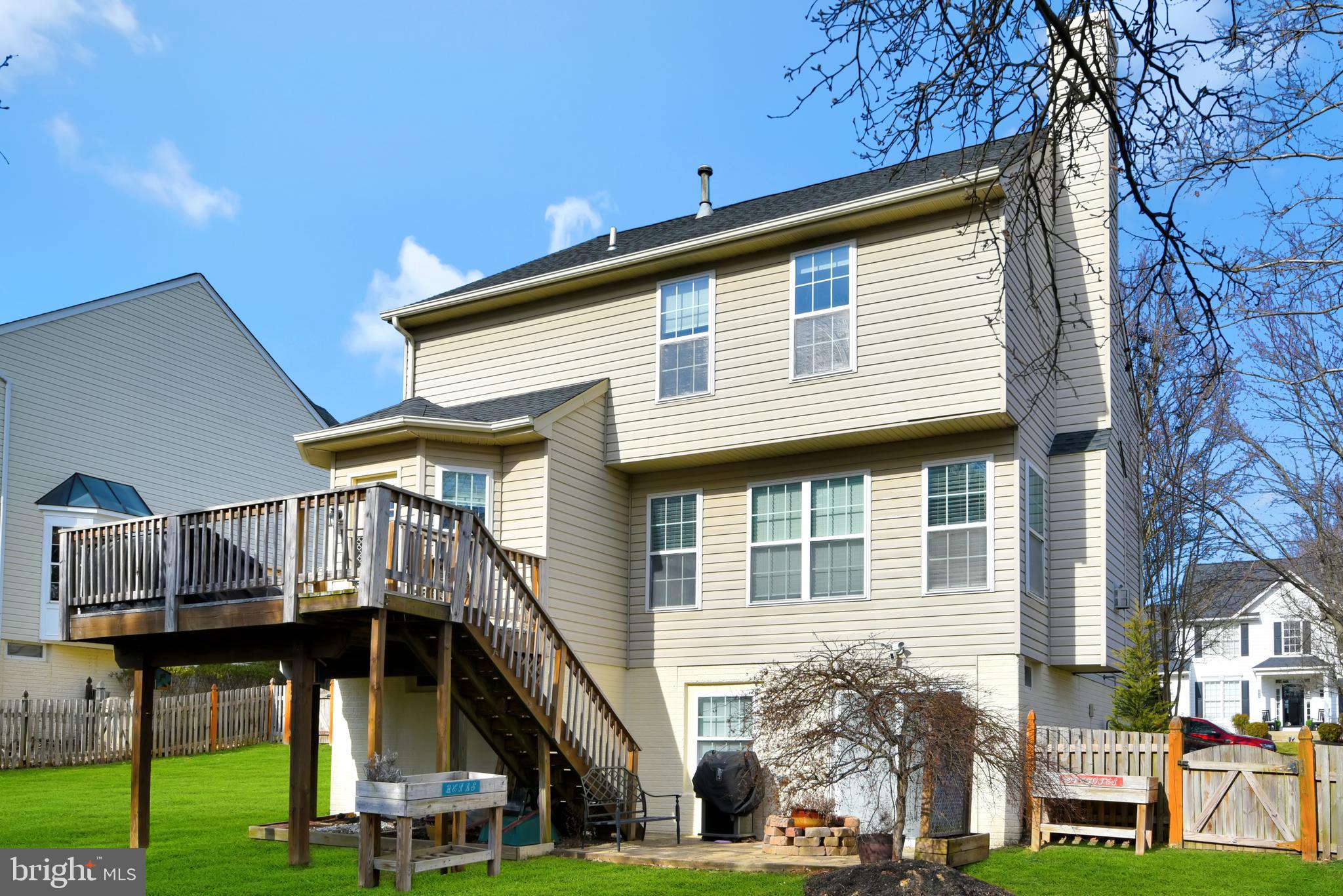 5944 Sandy Ridge Elkridge, MD 21075 - Photo 40 of 42 a view of house with a yard