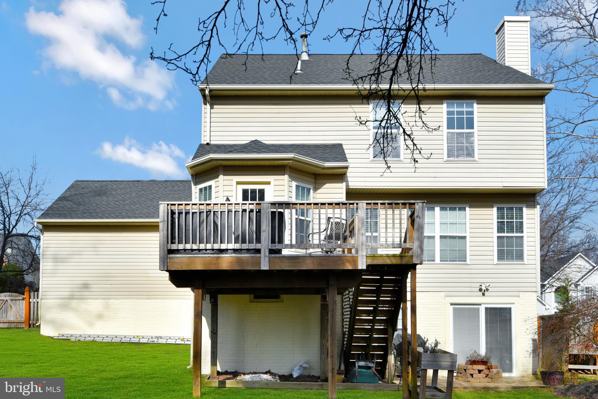 5944 Sandy Ridge Elkridge, MD 21075 - Photo 41 of 42 a view of small house with yard and furniture