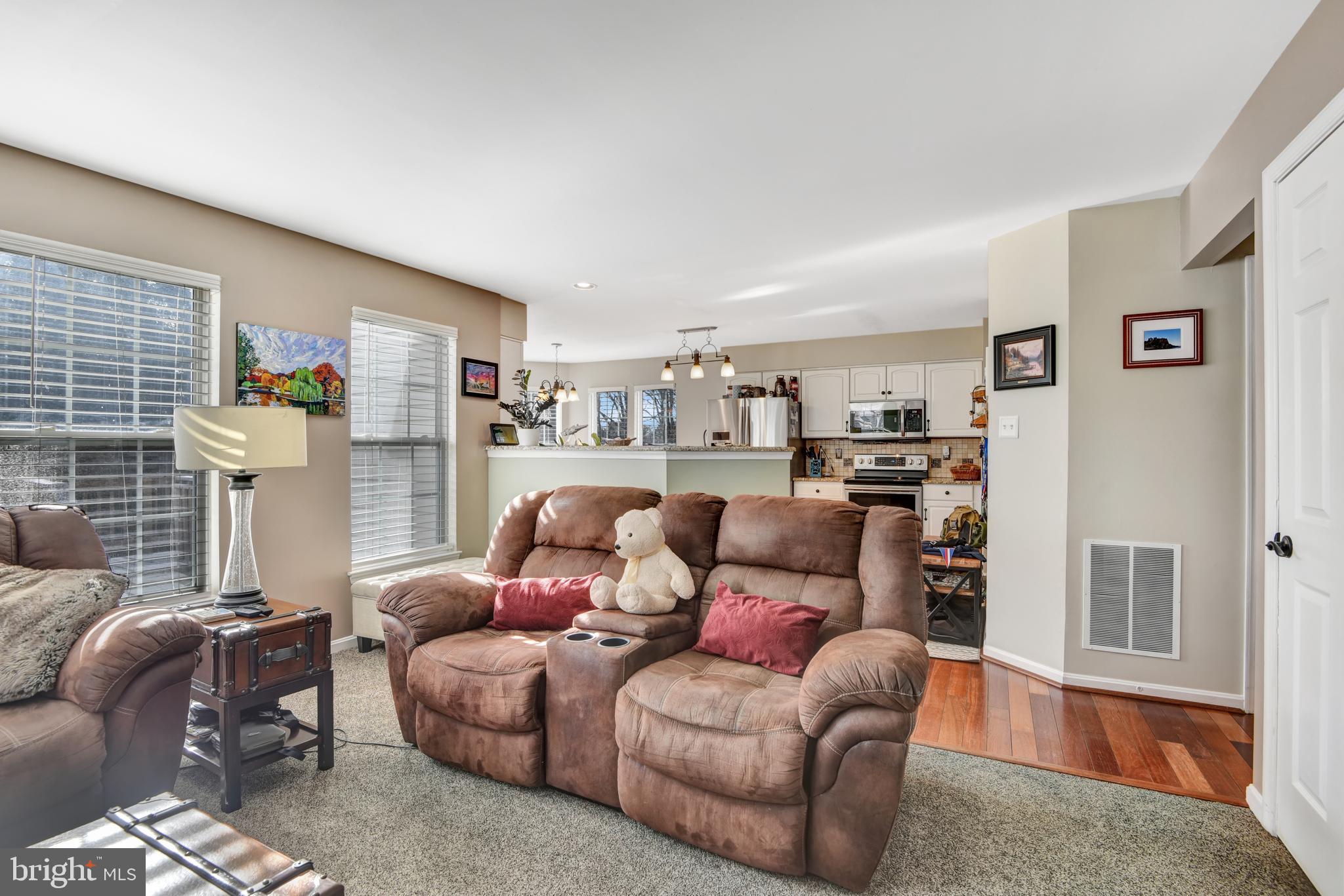 5944 Sandy Ridge Elkridge, MD 21075 - Photo 10 of 42 a living room with furniture and a wooden floor