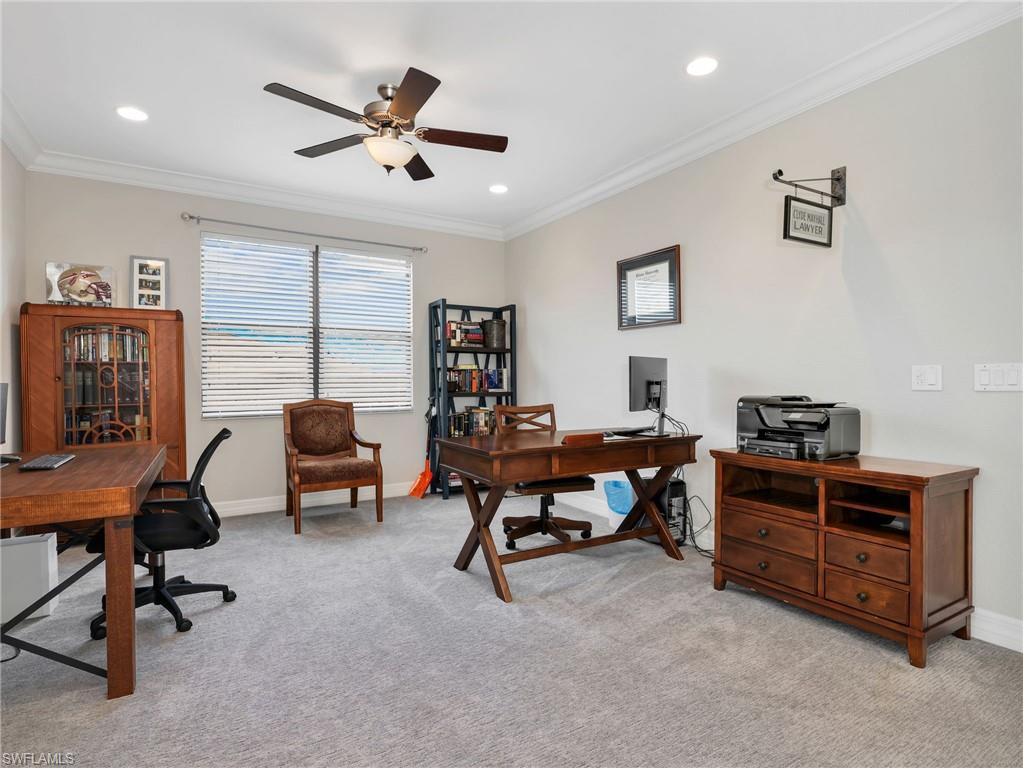 2756 Crystal Way Naples, FL 34119 - Photo 29 of 50 a view of a workspace with furniture and a window