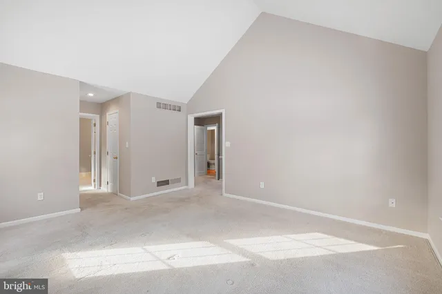 a spacious bathroom with a bathtub and a shower