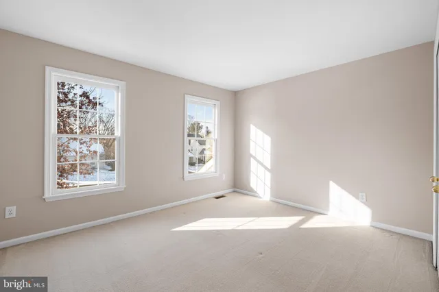 a view of a house with wooden floor and fence