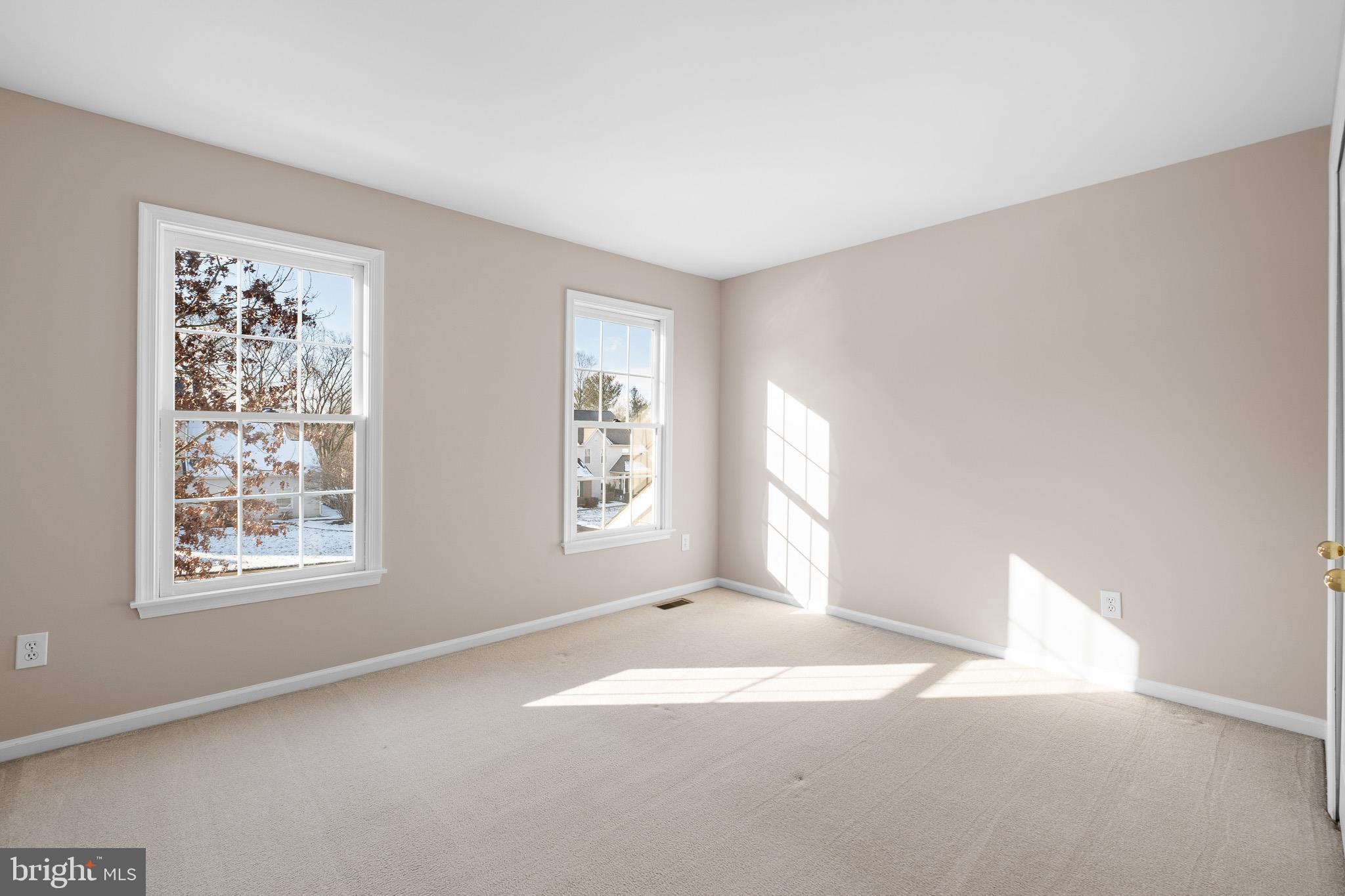 8 Arizona State Drive Newark, DE 19713 - Photo 25 of 32 a view of empty room with windows