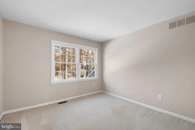 a front view of a house with yard