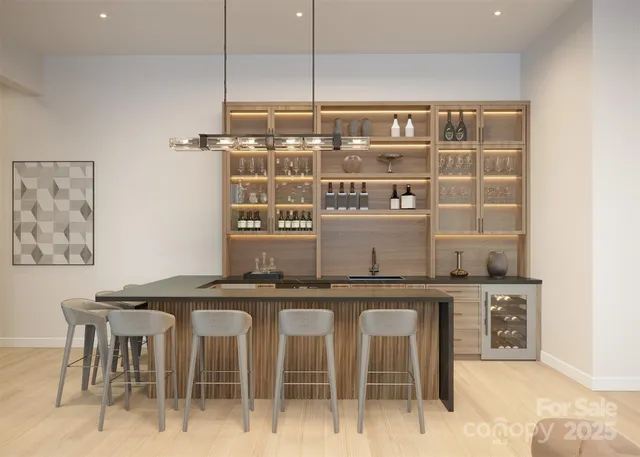 a kitchen with a table and chairs