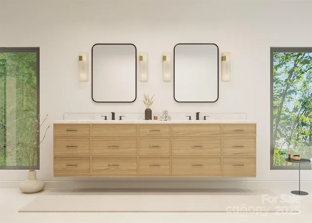 a bathroom with double vanity sink two mirror and a bathtub