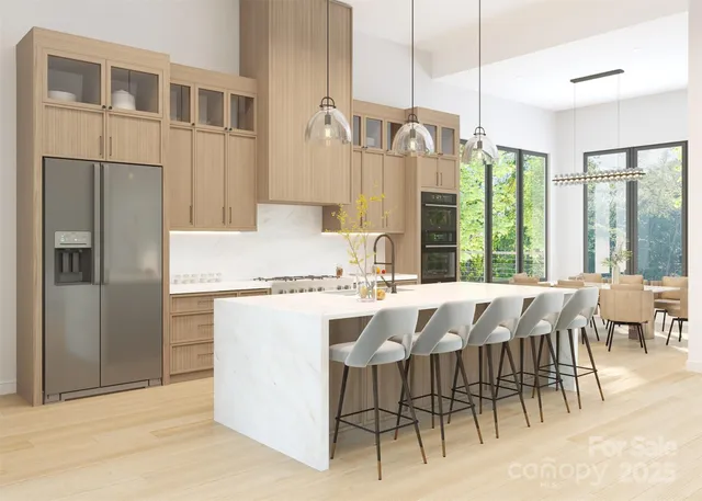 a dinning table and chairs in the kitchen