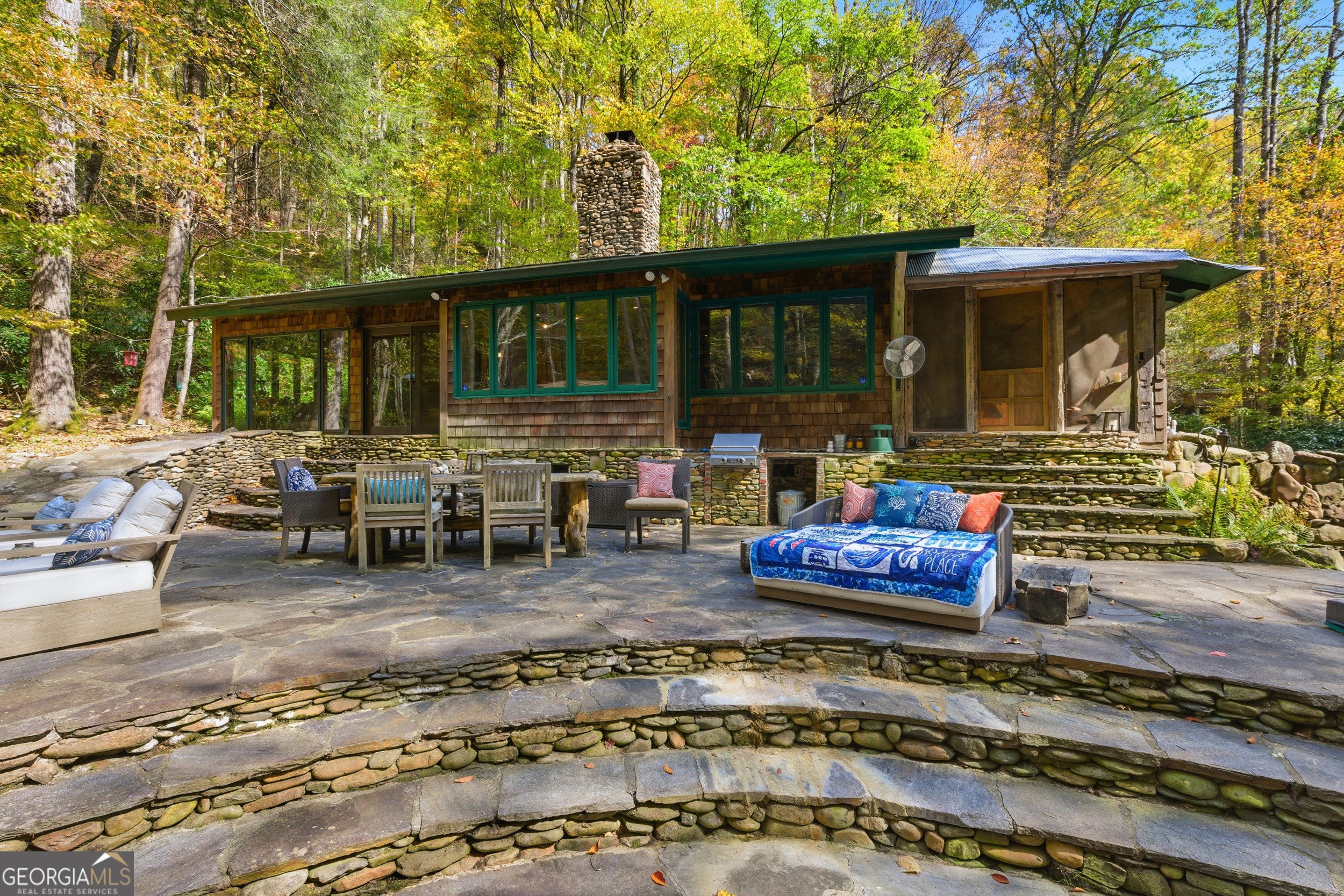 2965 Tate City Road Hayesville, NC 28904 - Photo 15 of 49 a view of a house with backyard porch and sitting area