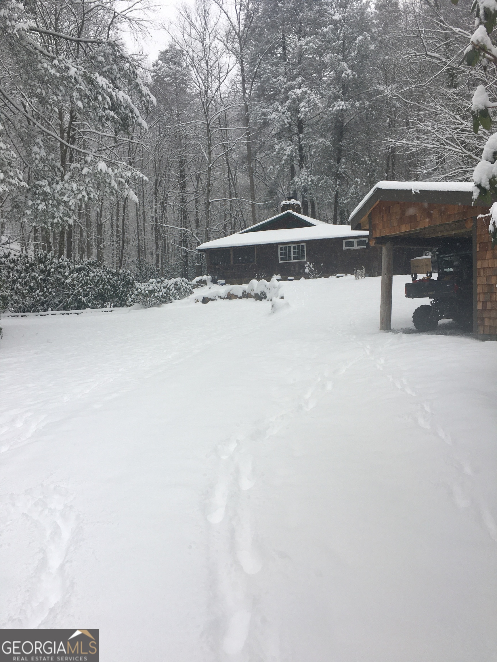 2965 Tate City Road Hayesville, NC 28904 - Photo 19 of 49 a view of a house with a snow in the yard