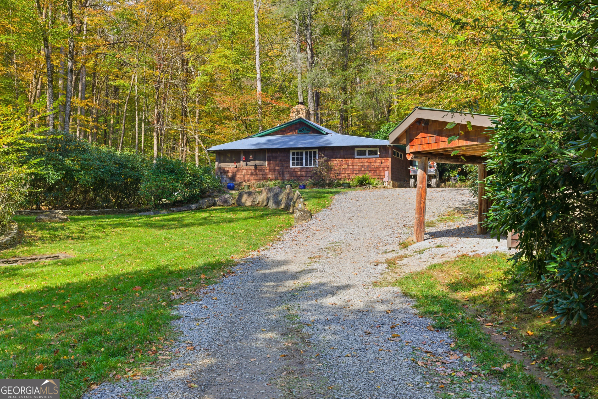 2965 Tate City Road Hayesville, NC 28904 - Photo 3 of 49 a front view of a house with garden