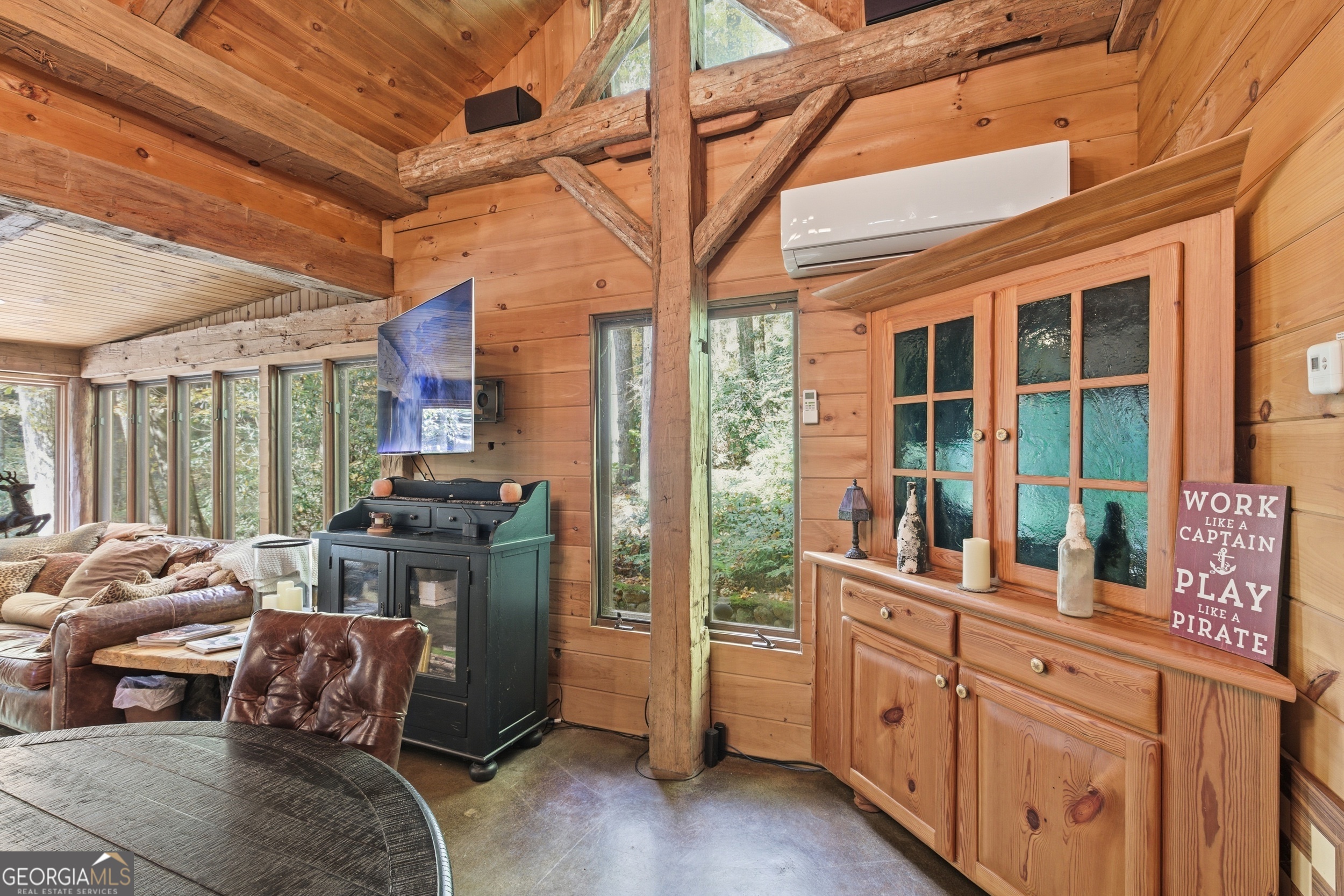 2965 Tate City Road Hayesville, NC 28904 - Photo 31 of 49 a living room with furniture and large windows