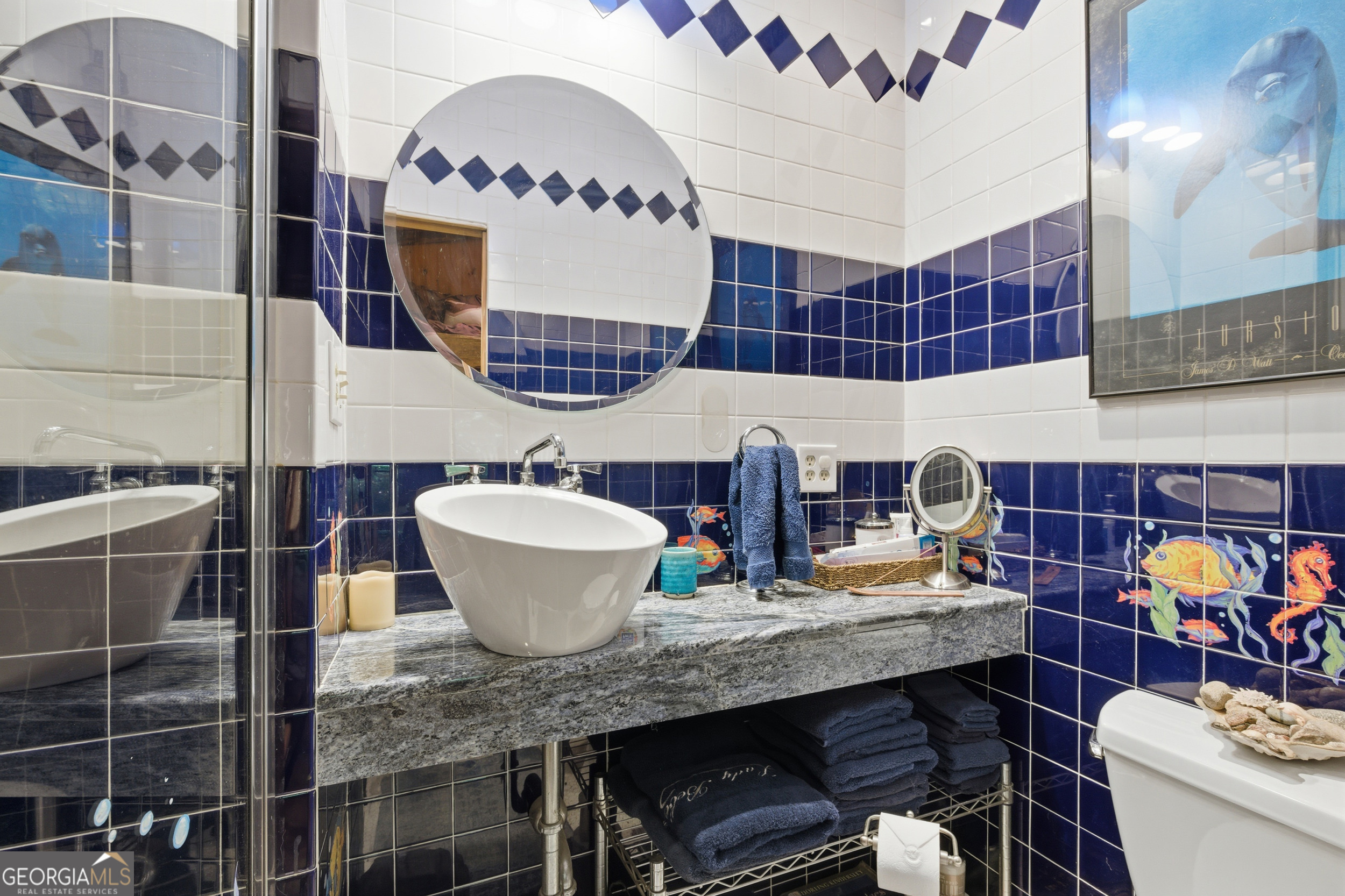 2965 Tate City Road Hayesville, NC 28904 - Photo 35 of 49 a bathroom with a granite countertop double vanity sink and a mirror