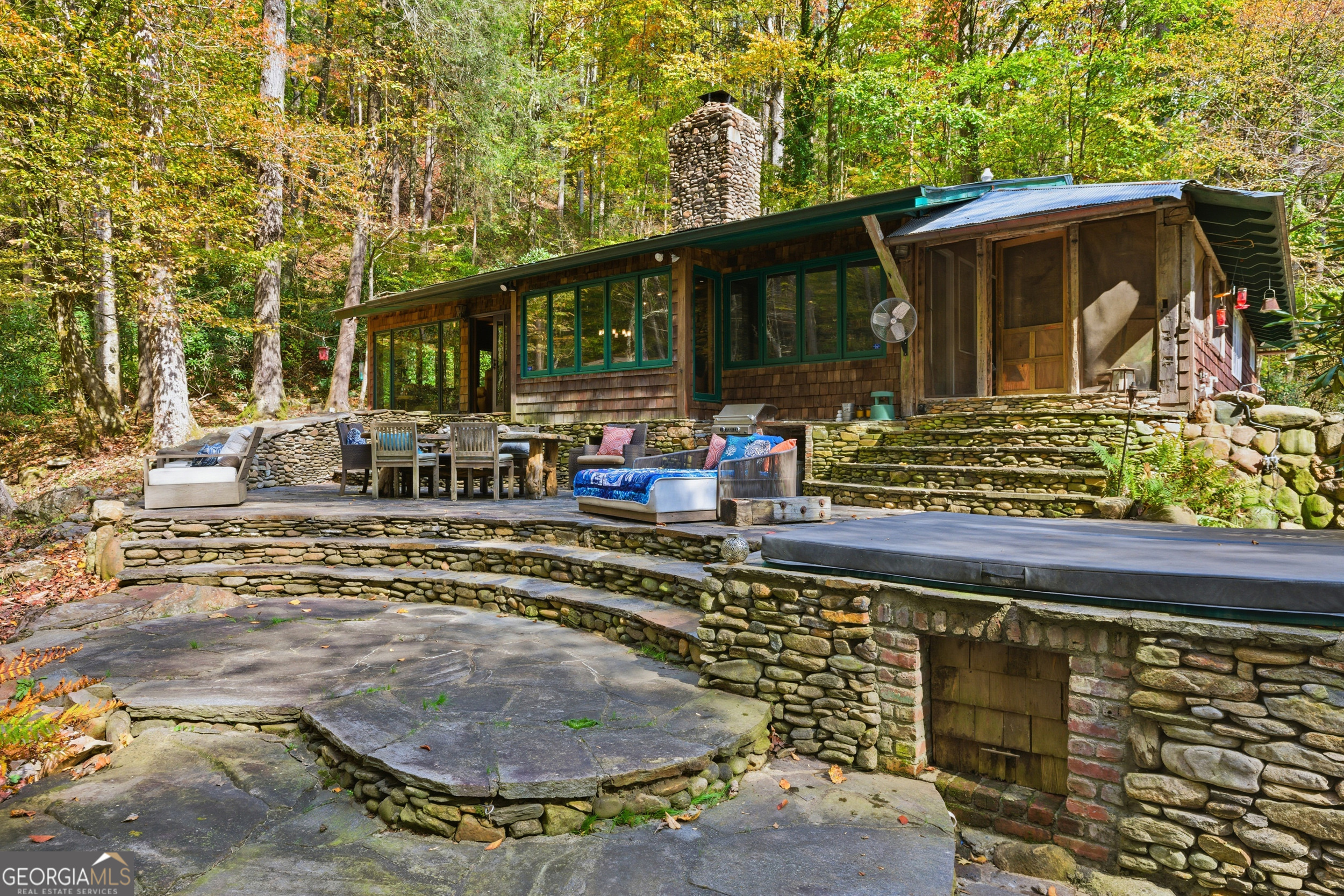 2965 Tate City Road Hayesville, NC 28904 - Photo 4 of 49 a view of a chairs and table in the patio