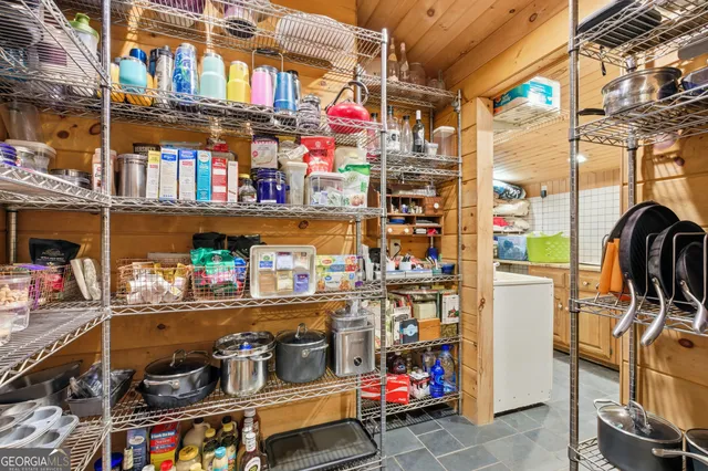 a room with lots of different colored cloths