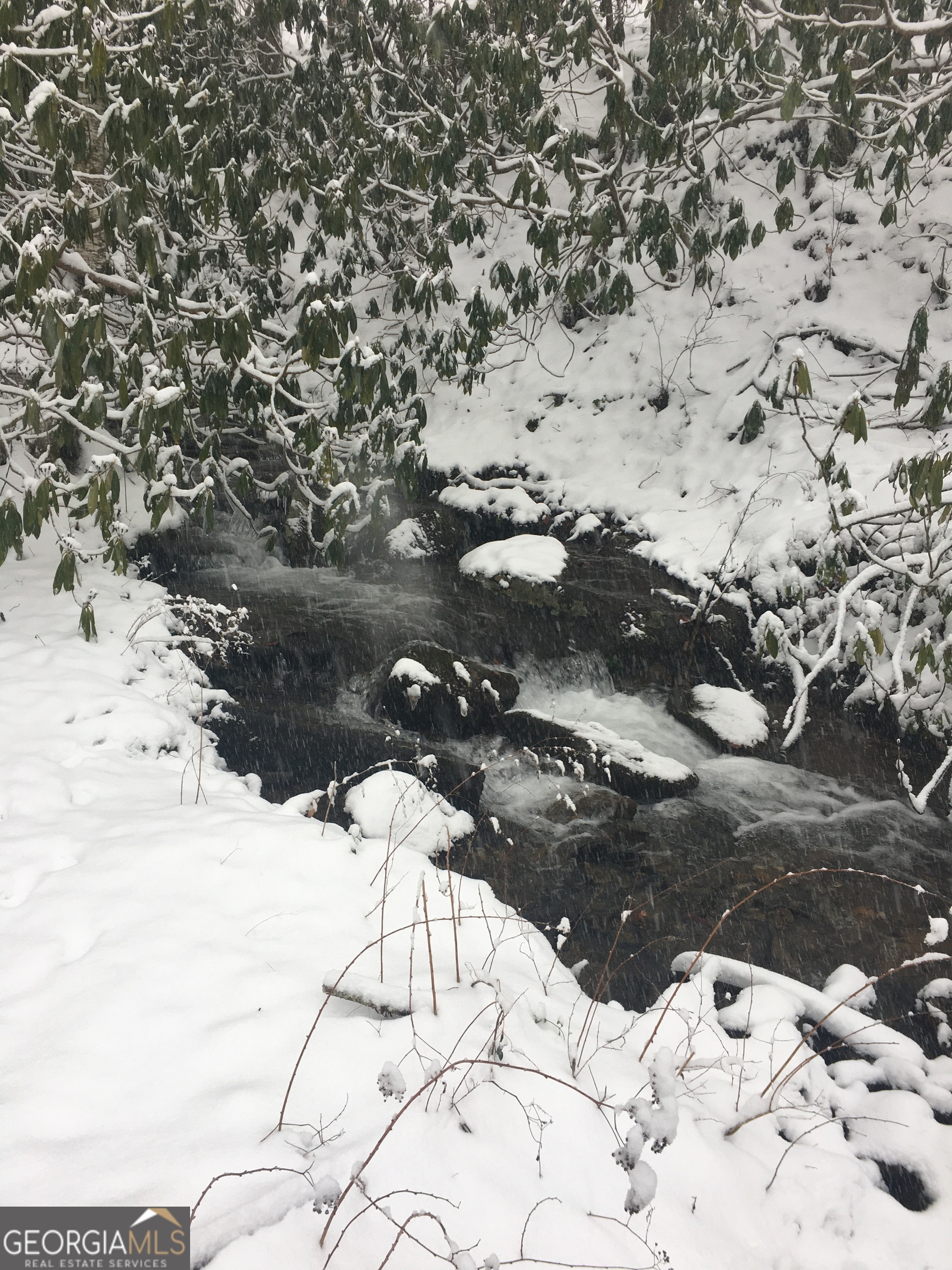 2965 Tate City Road Hayesville, NC 28904 - Photo 45 of 49 a view of white house with a yard covered in snow