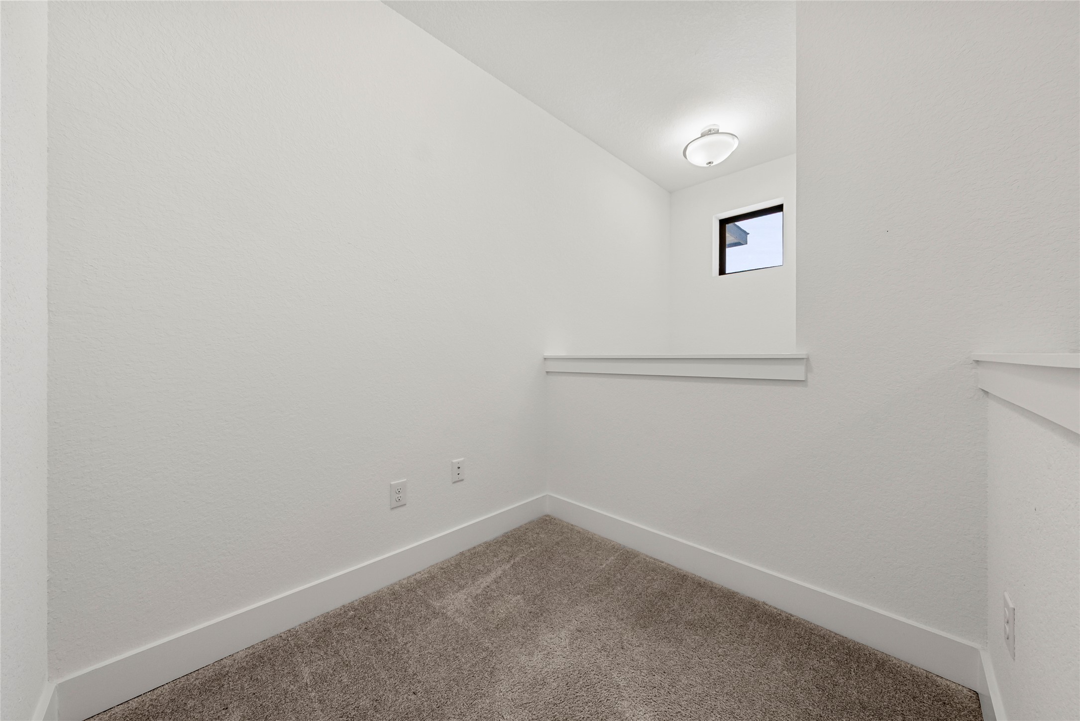 12315 Maypole Bend, Unit 1002 Austin, TX 78717 - Photo 13 of 29 Carpeted spare room featuring baseboards