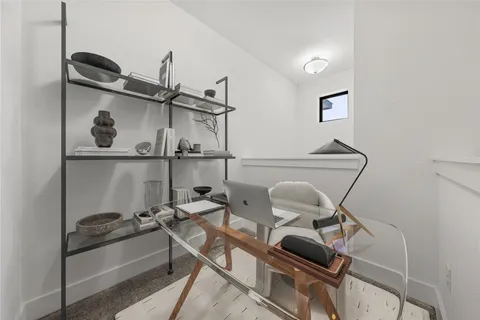 a bathroom with a double vanity sink mirror and shower