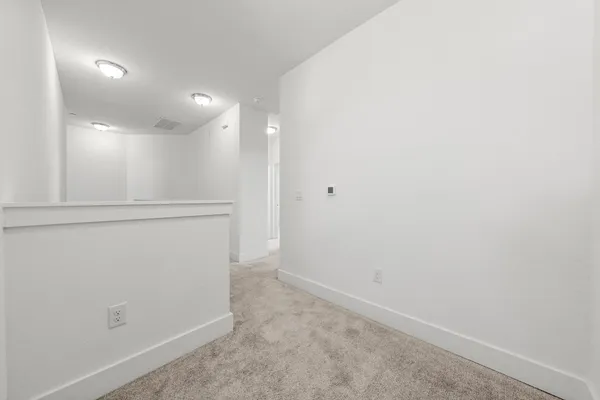 a view of an empty walk in closet