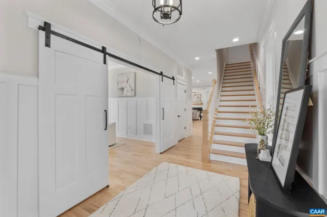 a kitchen with stainless steel appliances a sink and cabinets