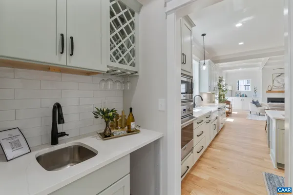 a bathroom with a double vanity sink mirror and double