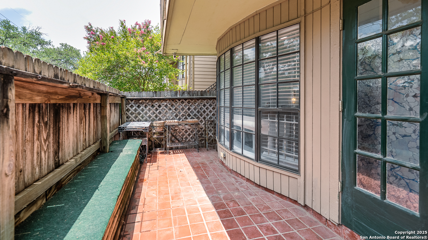 7711 Callaghan Road, Unit 714 San Antonio, TX 78229 - Photo 21 of 22 a view of balcony with wooden floor
