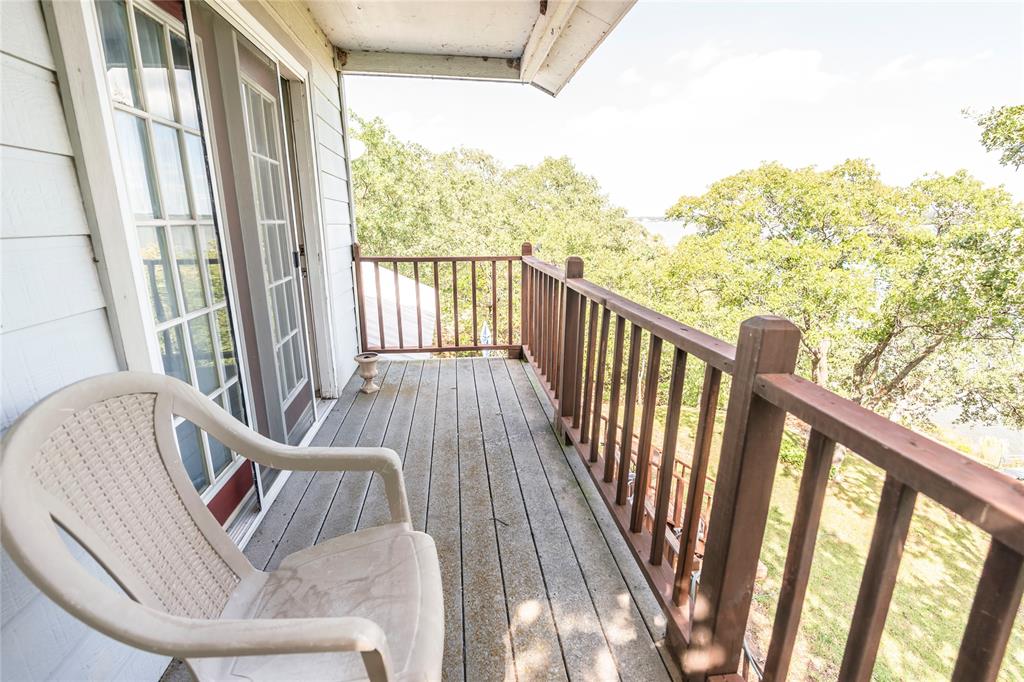 698 Storey Road Nocona, TX 76255 - Photo 12 of 34 a view of balcony with furniture