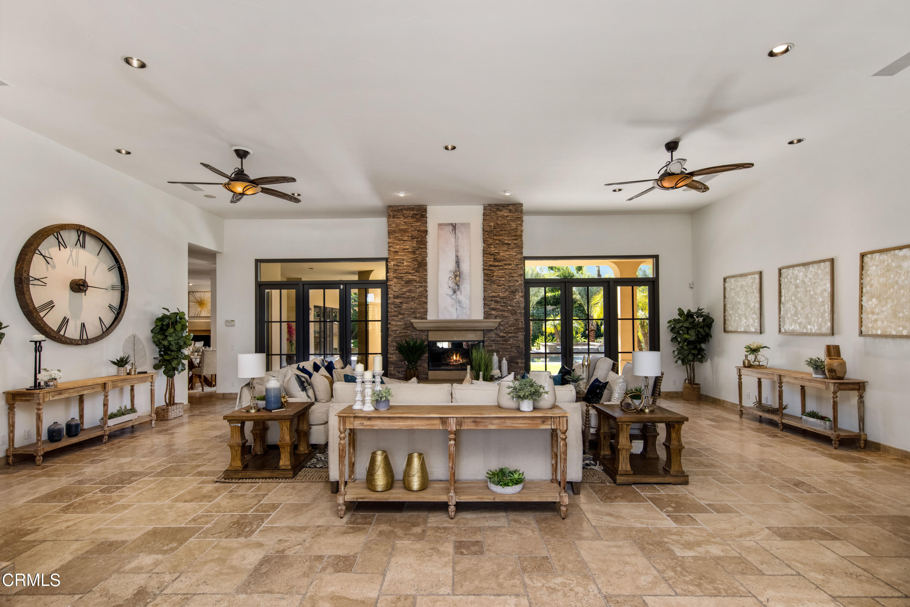 64435 Via Risso Palm Springs, CA 92264 - Photo 11 of 65 a living room with fireplace furniture and a large window
