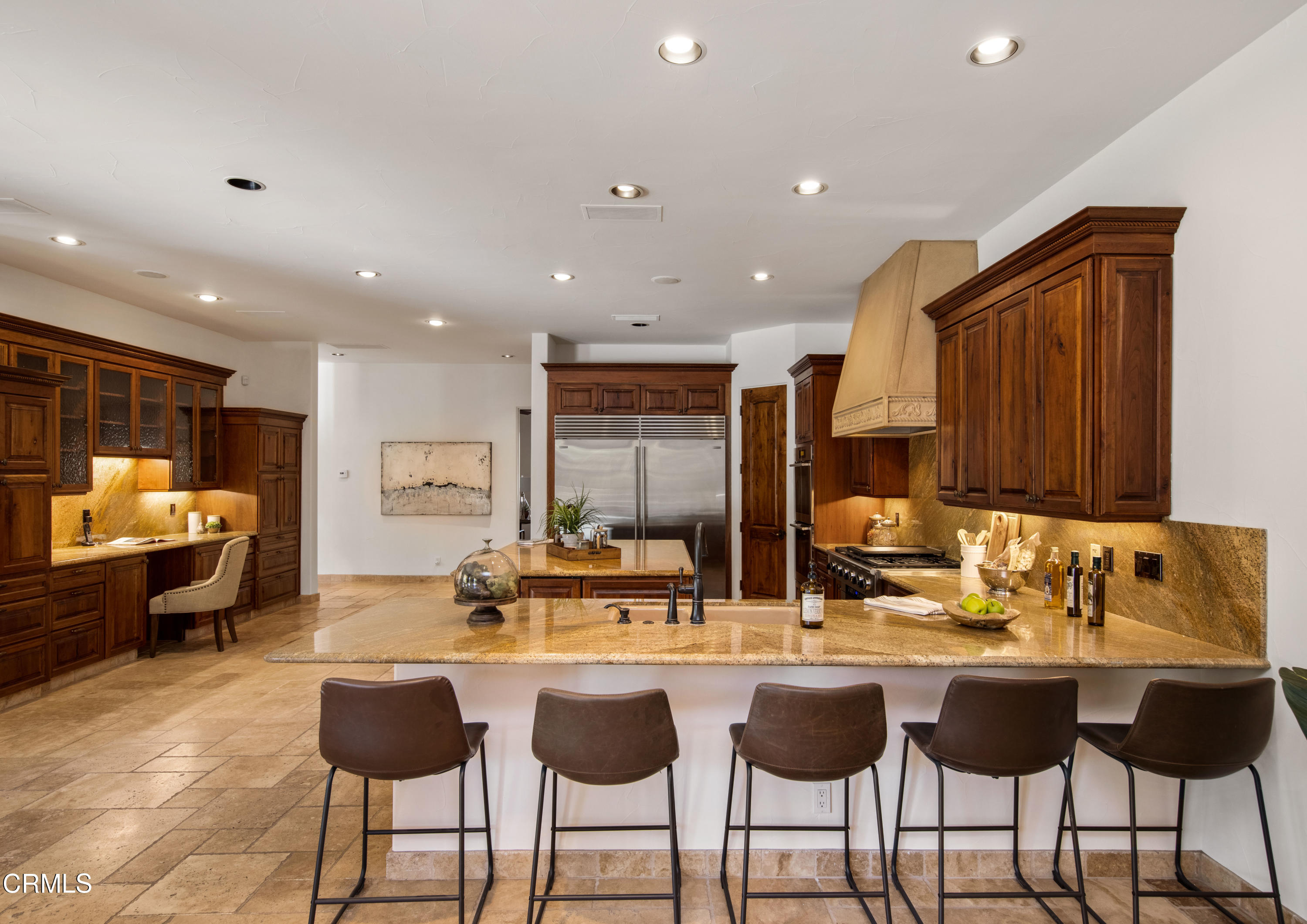 64435 Via Risso Palm Springs, CA 92264 - Photo 16 of 65 a kitchen with a sink and chairs