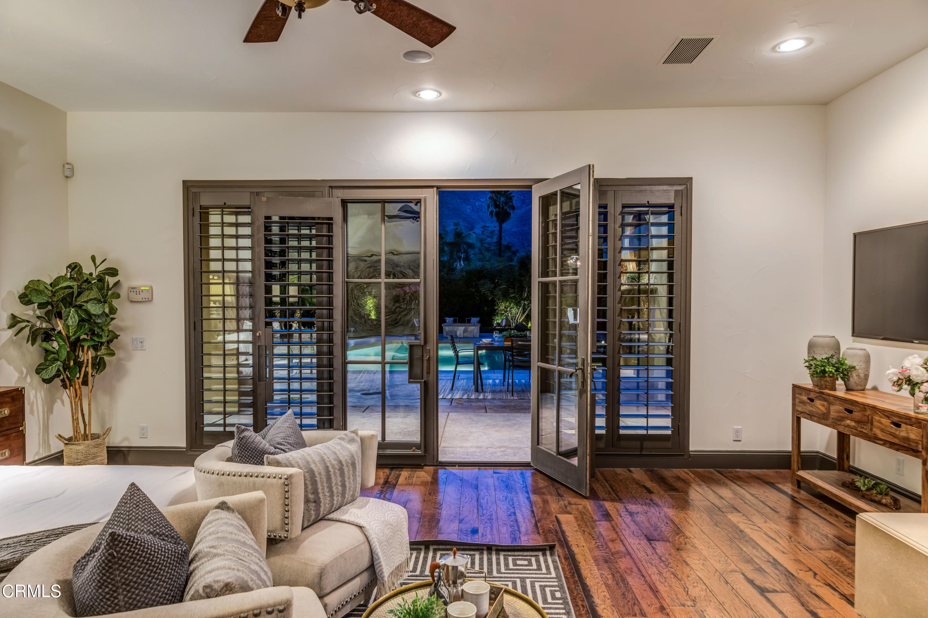 64435 Via Risso Palm Springs, CA 92264 - Photo 29 of 65 a living room with furniture and a flat screen tv