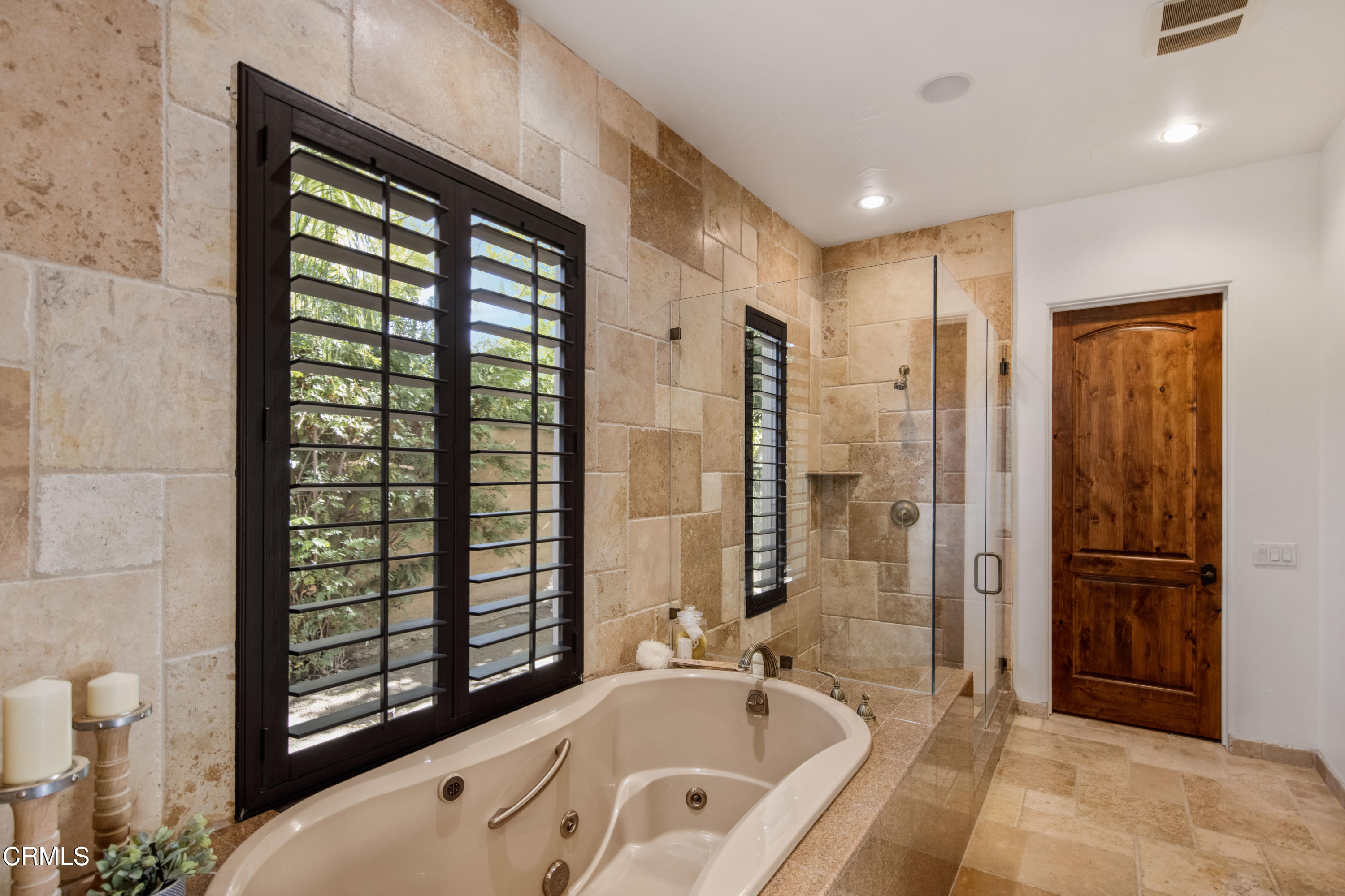64435 Via Risso Palm Springs, CA 92264 - Photo 30 of 65 a bathroom with a bathtub and a shower