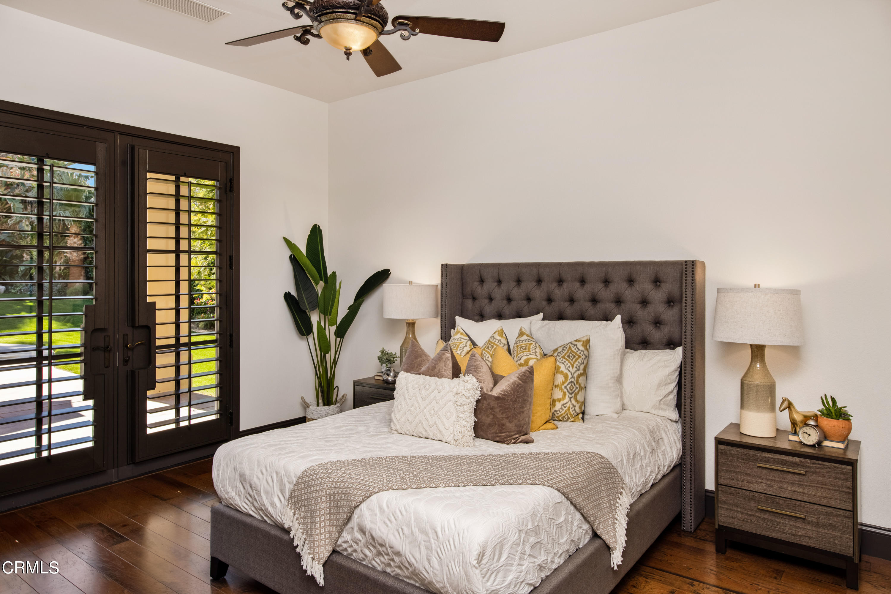 64435 Via Risso Palm Springs, CA 92264 - Photo 38 of 65 a bedroom with a large bed and a window