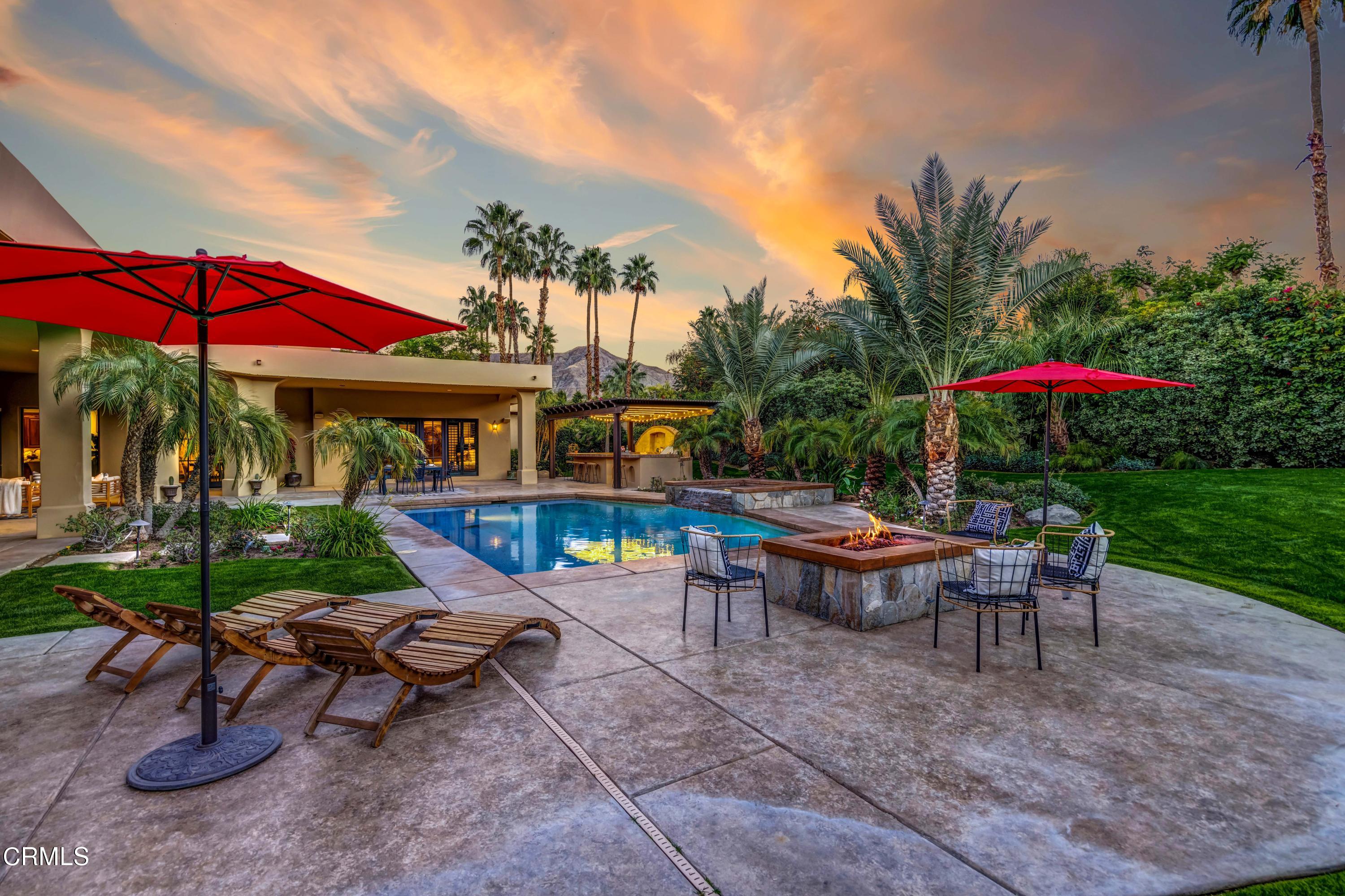 64435 Via Risso Palm Springs, CA 92264 - Photo 58 of 65 a view of a house with backyard sitting area and garden