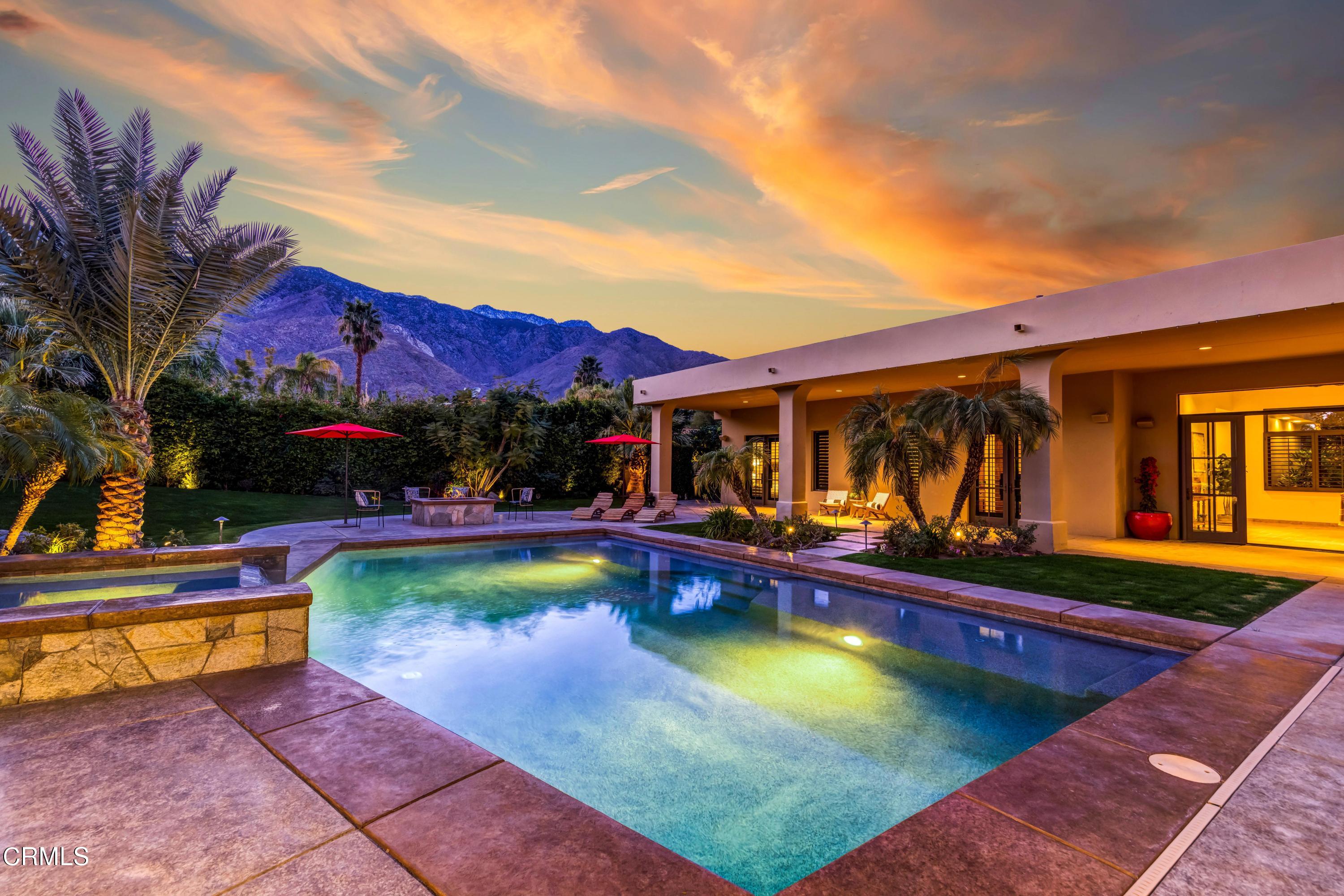 64435 Via Risso Palm Springs, CA 92264 - Photo 61 of 65 a view of a house with swimming pool and sitting area