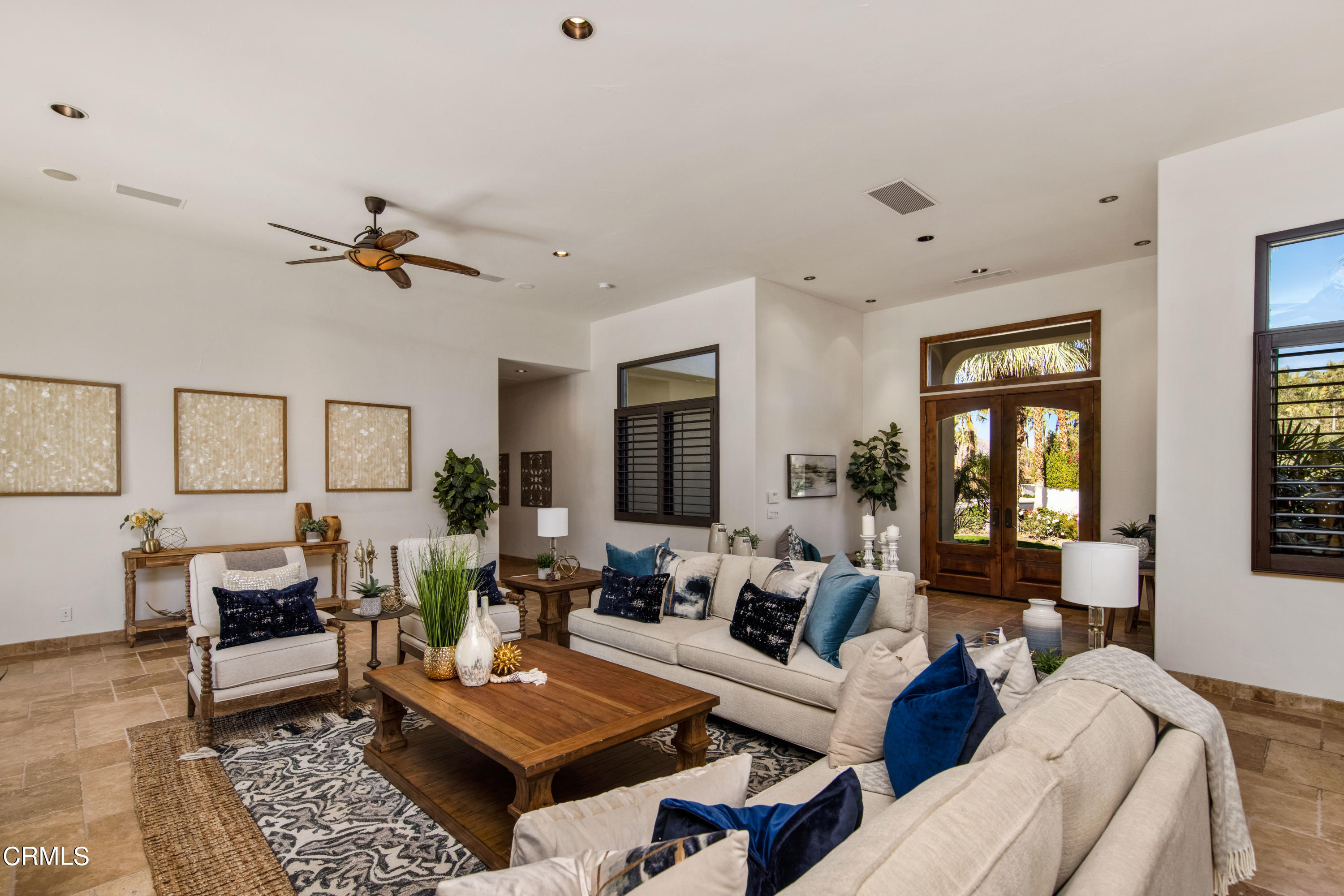 64435 Via Risso Palm Springs, CA 92264 - Photo 9 of 65 a living room with furniture a rug and a window