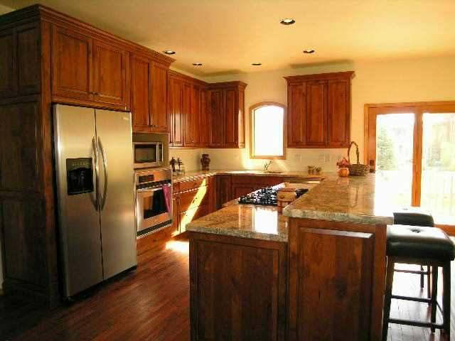 263 River's Bend Carbondale, CO 81623 - Photo 2 of 9 a kitchen with granite countertop a refrigerator stove and sink
