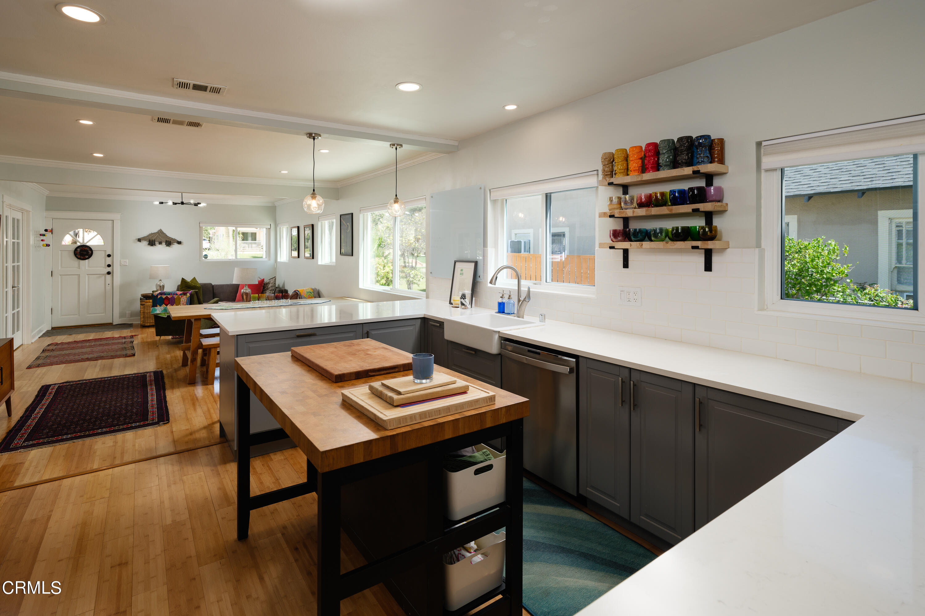 1794 Beverly Drive Pasadena, CA 91104 - Photo 15 of 56 a room with furniture a rug and a window