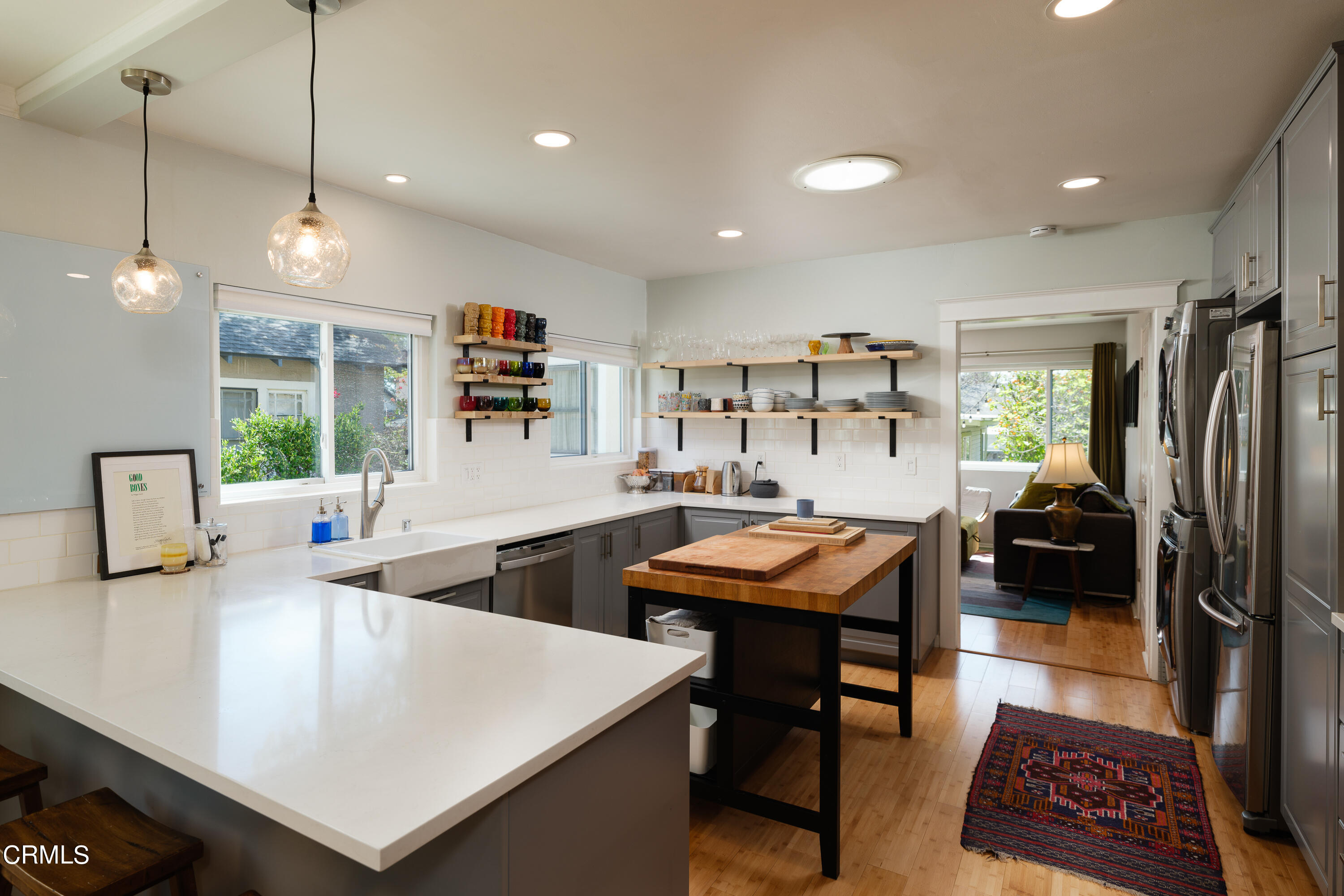 1794 Beverly Drive Pasadena, CA 91104 - Photo 16 of 56 a kitchen with stainless steel appliances granite countertop a sink a stove and a refrigerator