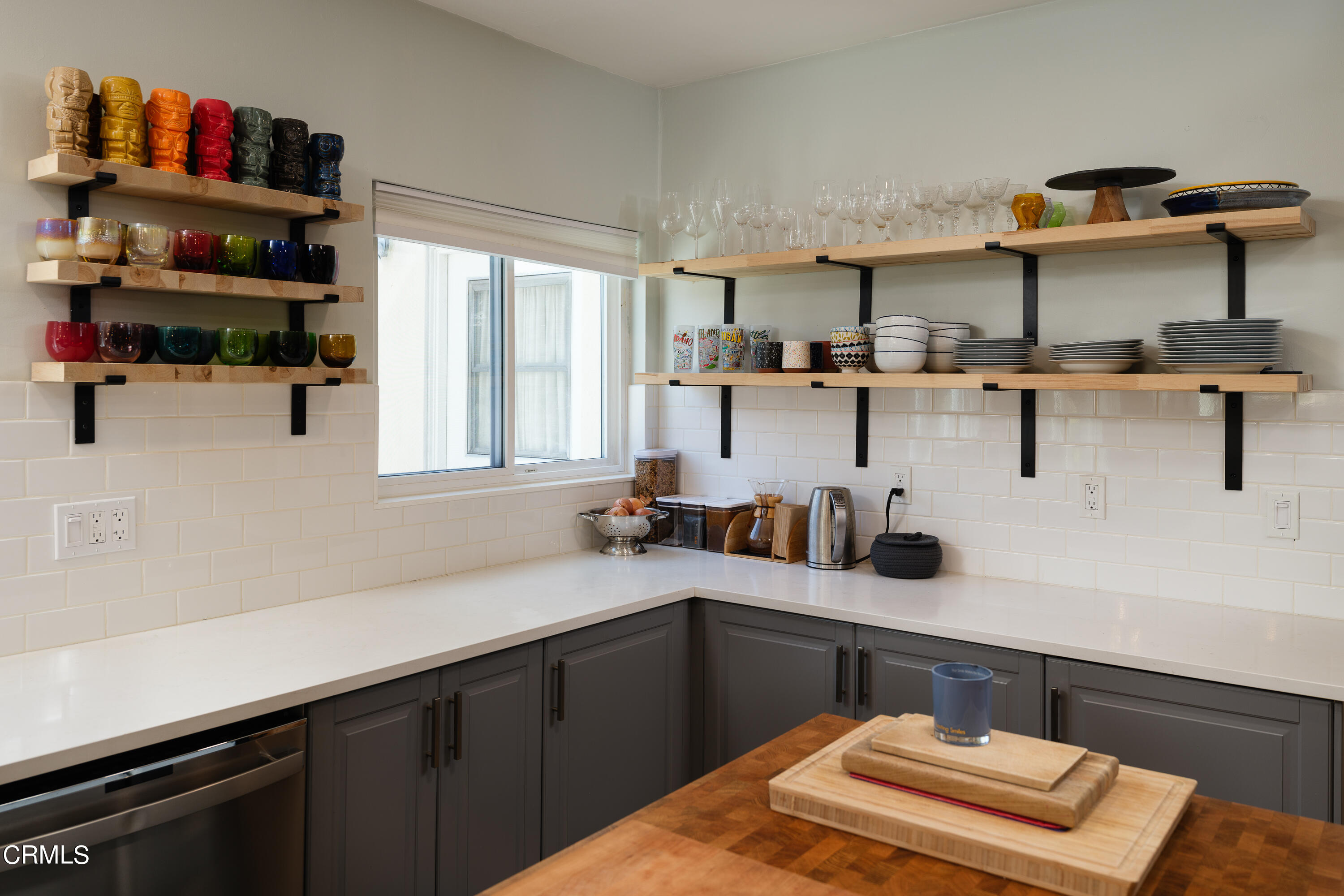 1794 Beverly Drive Pasadena, CA 91104 - Photo 17 of 56 a kitchen with stainless steel appliances a sink and cabinets